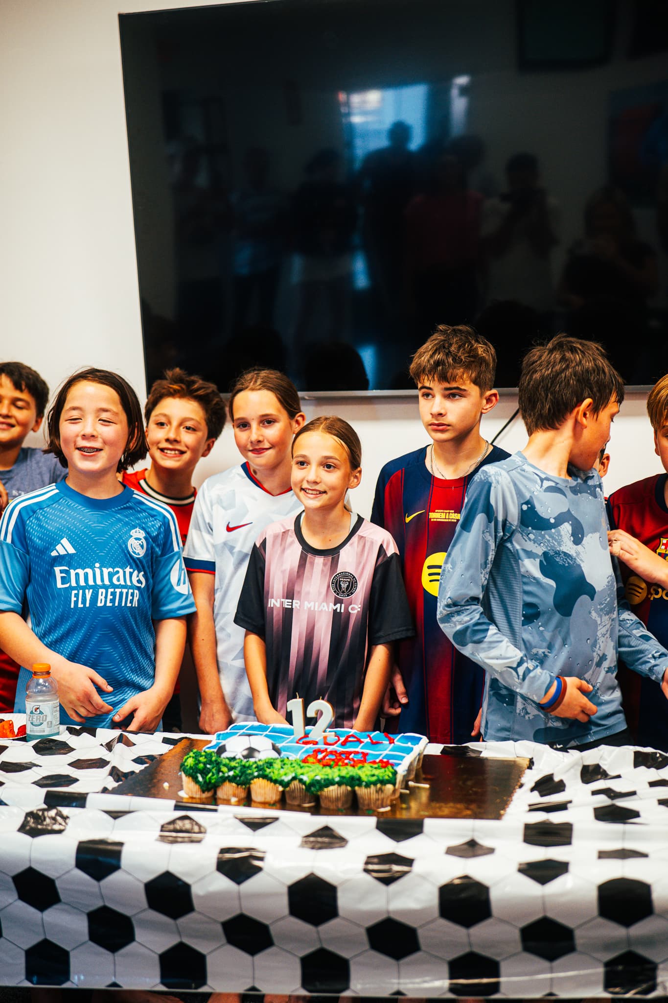 Kids celebrating at a SoFlo Soccer birthday party